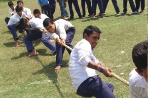 Tug of-war competition in progress during ‘Sports Mela’ at GGMS Bhure, Jammu on Friday.