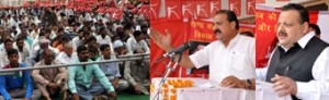 Minister for Industries and Commerce Surjeet Singh Slathia addressing a huge gathering at Ram Nagar on Saturday.