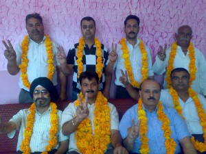 Newly elected office bearers of Lower Hari Market Association posing for a group photograph.