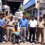 Police and Excise Department officials along with truck loaded with Polythene bags at Lakhanpur on Sunday.