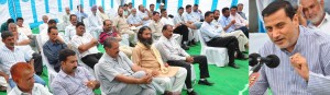 Minister for Health, Horticulture and Floriculture Sham Lal Sharma meeting with Panchs/sarpanchs at Kana Chak on Friday.
