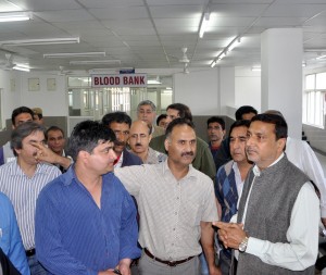 Minister for Health and Family Welfare, Sham Lal Sharma interacting with officials of Pvt Hospital on Sunday.