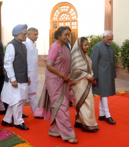  President Pratibha Patil, Vice President Hamid Ansari, Prime Minister Manmohan Singh and Lok Sabha Speaker Miera Kumar arriving at the Central Hall of Parliament House in a procession in New Delhi on Sunday. (UNI)
