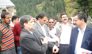 Minister for Forests, Environment and Ecology, Mian Altaf during his visit to rural areas of his constituency on Sunday.