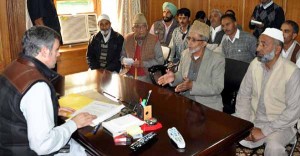 Chief Minister, Omar Abdullah interacting with a deputation during Awami Mulakat at Srinagar on Friday.