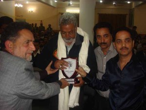 Minister for PHE, Irrigation and Flood Control, Taj Mohi-ud-Din receiving memento from members of MD Banday Memorial Society.