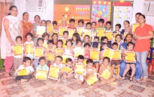 Students of DRS Kids along with teachers posing for a photograph during the summer camp.