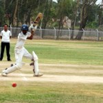 Batsman executive a square drive during a match of U-16 Cricket Tournament at GGM Science College Hostel ground on Monday.
