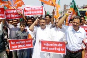 BJP activists protesting at Vijaypur on Wednesday. 