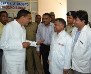 Minister for Health, Horticulture and Floriculture, Sham Lal Sharma with staff of doctor’s of Trauma Center cum Emergency Hospital at Jajjar Kotli on Tuesday.