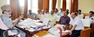 Minister for Rural Development Ali Mohd. Sagar taking a review meeting at Srinagar on Thursday.