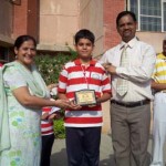 Akshat Sharma of Class-VIII of Jodhamal Public School being felicitated by Principal Jodhamal School Trilok Singh Bist for being selected by Royal Indian Military College (RIMC) Dehradun as its 2012 candidate from J&K. While felicitating Akshat, School Principal lauded the efforts of the teachers for the School’s excellence .