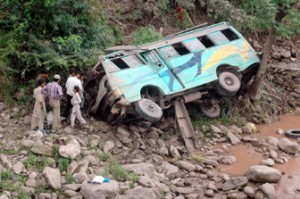Ill-fated mini-bus which landed into nallah, causing injuries to 42 persons near Manjakote on Wednesday. 