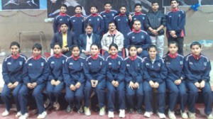 Young fencers posing alongwith the members of the screening committee at MA Stadium in Jammu on Monday.