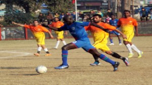 With long strides footballer racing in the rivals territory in sight of scoring a goal during a football match at GGM Science College Ground on Friday.                    - Excelsior/Rakesh