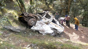 Wreckage of Sumo which landed into deep gorge after accident at Shahpur in Poonch on Monday.    -Excelsior/ Harbhajan