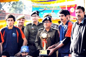 Atul Goel, SSP Jammu along with the winner of  Range Police Volleyball Friendship Cup posing for a group photograph on Thursday.