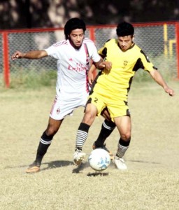 Players in action during the ongoing Sher-e-Kashmir Gold Cup Football tournament on Thursday.   -Excelsior/Rakesh