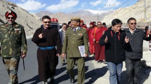 CEC Rigzin Spalbar inspecting the site for construction of four line road at Leh on Wednesday.