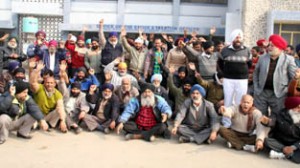 Transporters raising slogans during protest at Jammu on Friday.