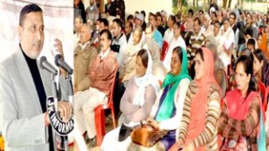 Minister for PHE Sham Lal Sharma addressing public meeting at Akhnoor on Sunday.