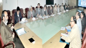 Chief Secretary Mohd Iqbal Khanday chairing a meeting at Jammu on Monday.