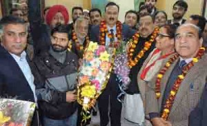 Provincial president NC Devender Singh Rana and others welcoming Sajjad Ahmed Kitchloo at Sher-e-Kashmir Bhavan on Saturday.