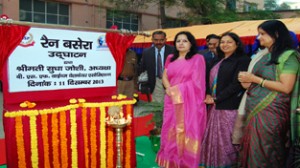 BWWA chief Sudha Joshi inaugurating night shelter at Ram Manohar Lohia Hospital in Delhi.