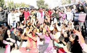 NGO Safaikaramcharis protesting at Jammu on Friday. -Excelsior/Rakesh