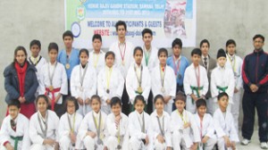 Medalists of Jodhamal Public School posing for a group photograph during felicitation function.