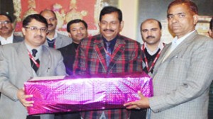 CEO SMVDSB, MK Bhandari and other dignitaries distributing sports gear among educational institutions on Friday. 