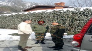 Chief Minister Omar Abdullah inter-acting with Northern Army Command Chief Lt Gen Sanjiv Chachra in Srinagar on Thursday.