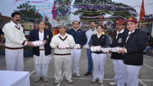 Dignitary distributing prizes during Raising Day celebration at Jammu.