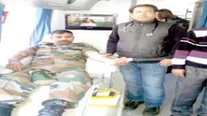 A soldier donating blood on Thursday.