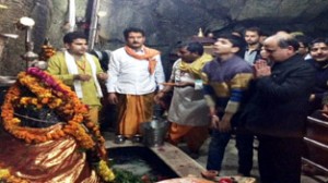 Deputy Chief Minister Tara Chand and others paying obeisance at Shiv Khori shrine on Wednesday.