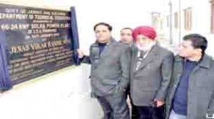 Minister of State for Power, Vikar Rasool Wani inaugurating Solar Power Plant at ITI Pampore on Monday.