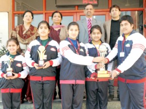 The students of  Jodhamal  Public School posing for group photograph along with their trophies on Wednesday.