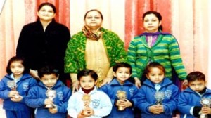 Winners of Hindi Poetry Recitation Competition posing for a photograph alongwith staff members at DPS in Jammu on Friday.