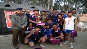 Winners of Volleyball title posing alongwith SP Reasi, Vivek Gupta and DYSSO Reasi Dr Swaran Singh Chib on Thursday.