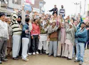 People protesting at Ramgarh on Friday. -Excelsior/ Gautam