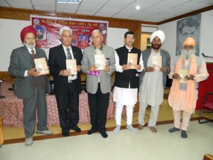 Karam Chand Shekhon’s Punjabi book ‘Tureya Chal’ being released during a function of J&K Punjabi Sahit Sangam on Monday.