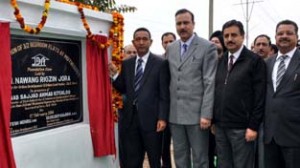 Minister for ULBs Nawang Rigzin Jora and MoS Home, Sajad Ahmed Kichloo laying foundation stone of residential flats at Muthi on Saturday.