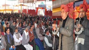 Minister for PHE Sham Lal Sharma and MP Madan Lal Sharma addressing gathering of Panchs and Sarpanchs at Akhnoor on Friday.