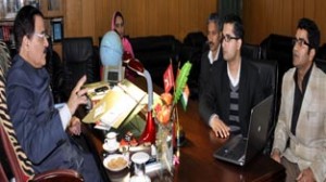 Speaker Legislative Assembly Mubarak Gul interacting with representatives of software company at Jammu on Thursday.