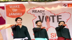 Artists performing during Wake Up Jammu campaign at  GDC Bishnah on Friday.