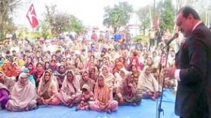 MLA Surjeet Singh Slathia addressing public gathering in Vijaypur on Tuesday.