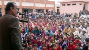 MLA Surjeet Singh Slathia addressing public gathering on Friday.