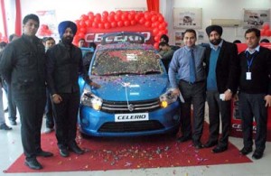 Officials of Peaks Auto unveiling ‘Celerio’ on Saturday.  -Excelsior/Rakesh