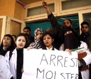 Staff of SMHS hospital shouting slogans during a protest against former Minister Shabir Khan in Srinagar on Saturday. -Excelsior/ Amin War