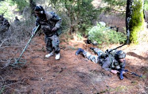 Army jawans taking positions during search operation at Tangmulla forests in Rafiabad on Sunday. -Excelsior/Aabid Nabi